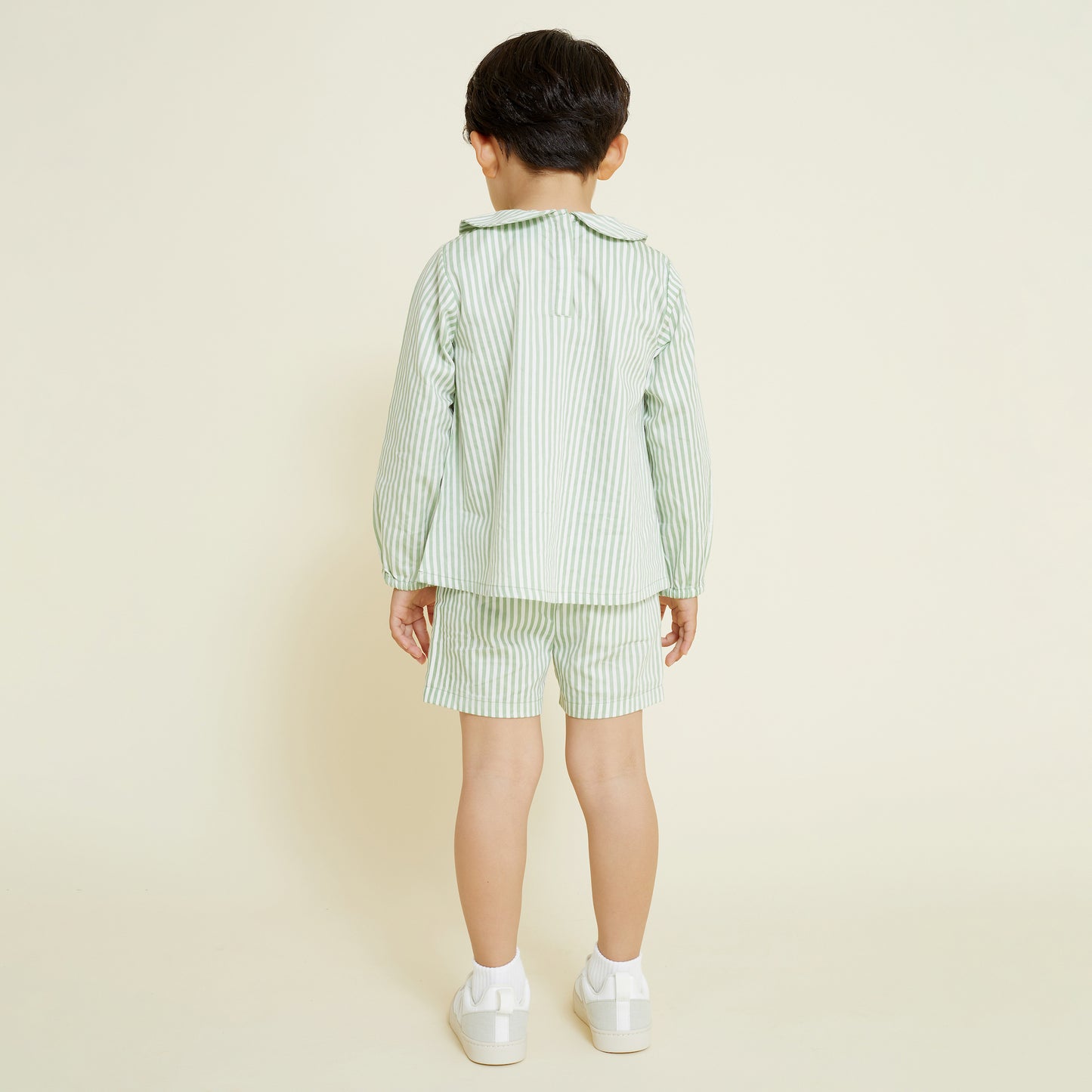 Young boy back detail of casual pull on short in sage and milk white stripe