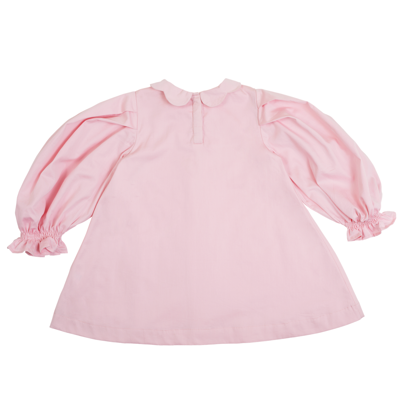 back view of girls' scallop collar smock dress in light pink, showing button up details at back