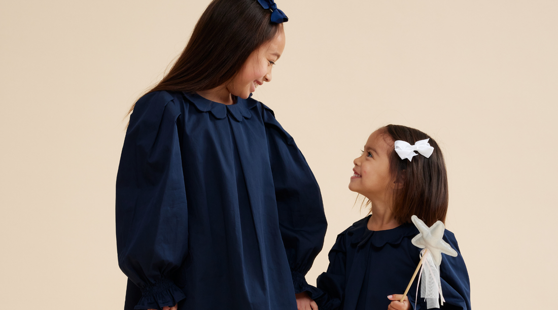 Prudie and Primmie Scallop Detail Smock Dress in cotton satin, showing smocked bodice and scallop collar detail