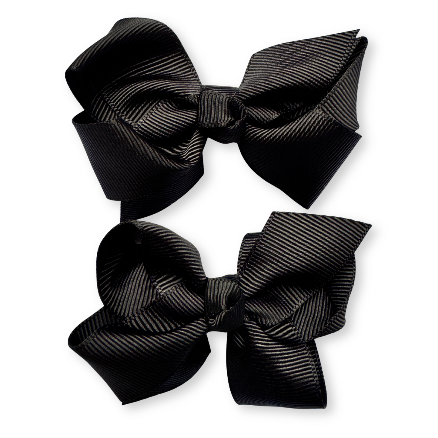 Two black hair bows on a white background